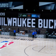 AUGUST 26: Officials stand beside an empty court after the scheduled start of game five between the Milwaukee Bucks and the Orlando Magic in the first round of the 2020 NBA Playoffs at AdventHealth Arena at ESPN Wide World Of Sports Complex on August 26, 2020 in Lake Buena Vista, Florida.